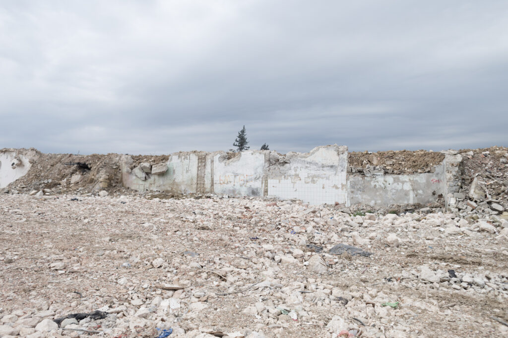 A pile of rubble now sits where apartments once stood in Antakya’s Esenlik neighborhood (Kyriakos Finas)