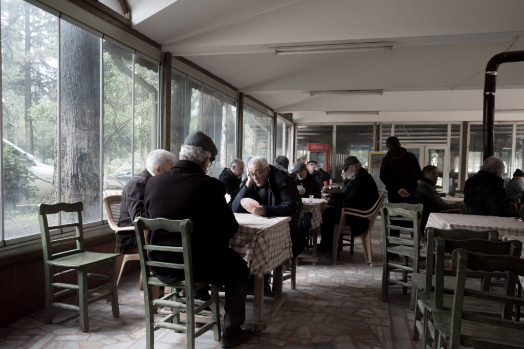 Men play cards in a cafe in Antakya in February 2024 (Kyriakos Finas)