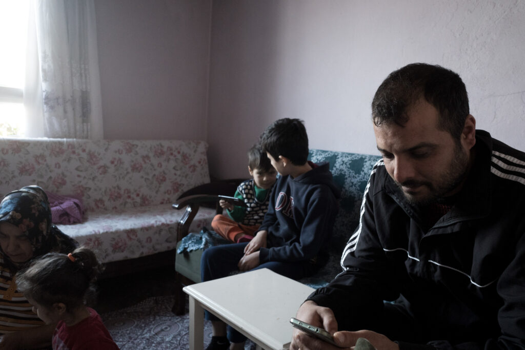 Adnan Dalmiş sits with his children and his mother (Kyriakos Finas)