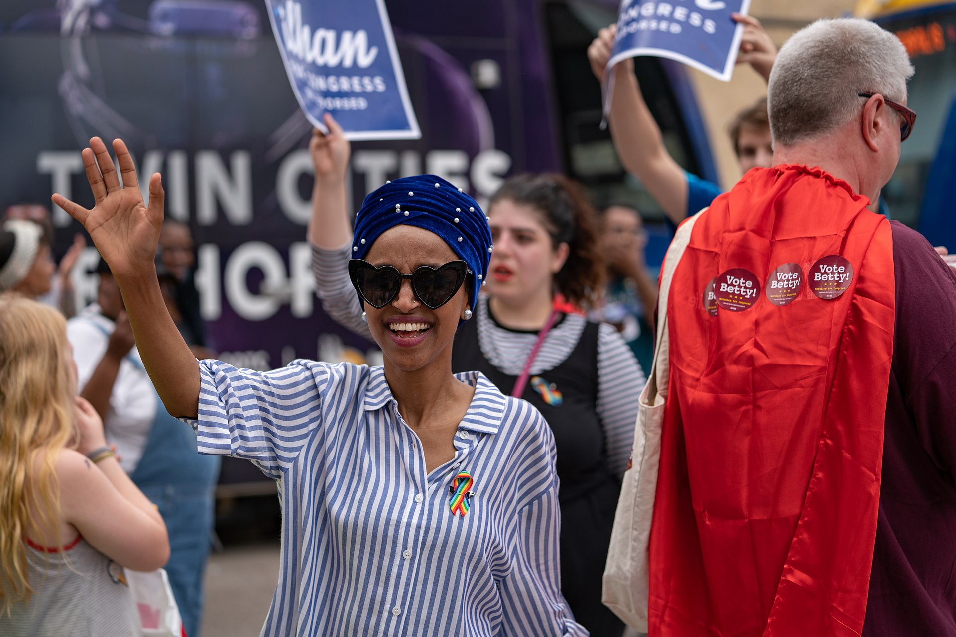 1920px-Ilhan_Omar_for_Congress_-_Twin_Cities_Pride_Parade_2018,_Minneapolis,_Minnesota_(28131759337)