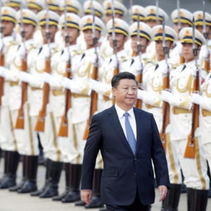 China's President Xi Jinping reviews honour guards during a welcoming ceremony in Beijing Inkstick Media