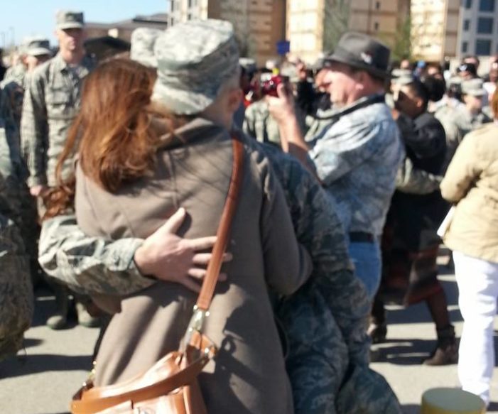Sarah reuniting with her servicemember after a family separation.