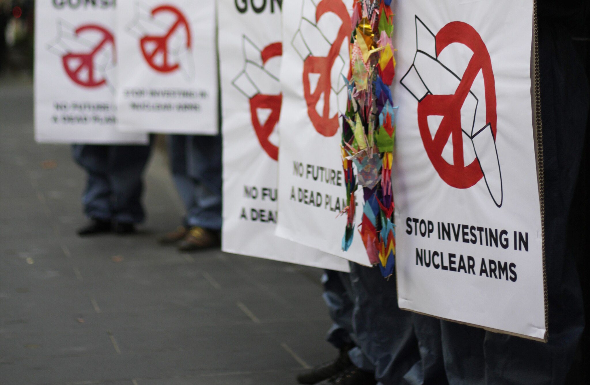 2048px-Protest_against_investments_in_nuclear_weapon_companies
