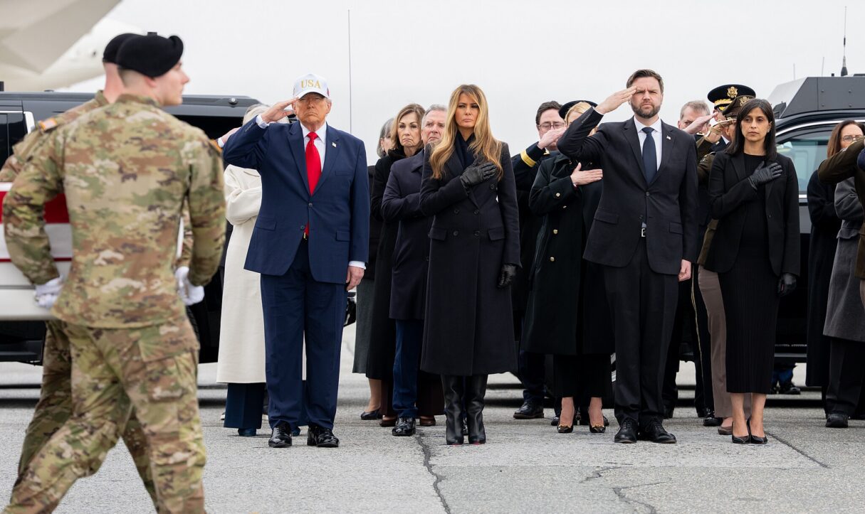 Donald Trump, Melania Trump, JD Vance, and Usha Vance salute during the dignified transfer of fallen American troops in March 2026 (Emily J. Higgins/White House/Wikimedia Commons)