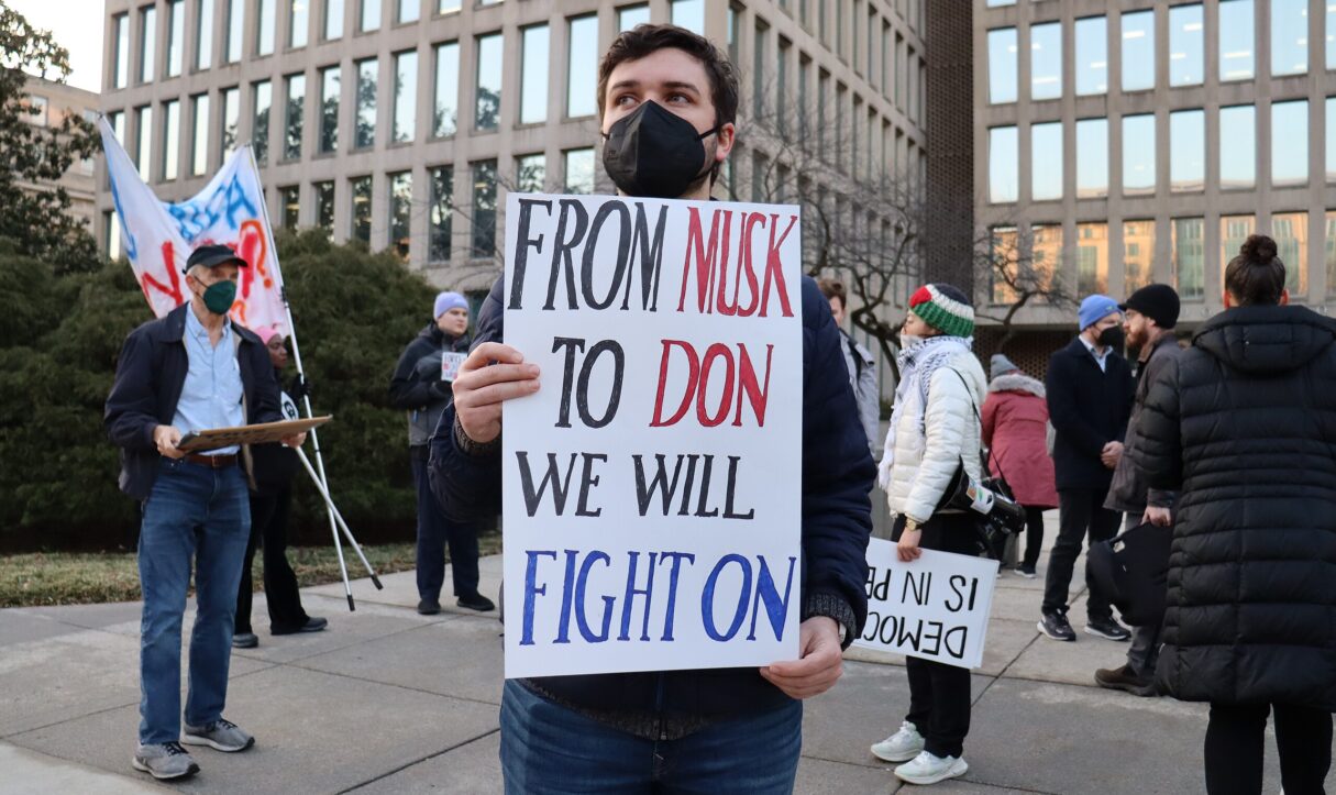 Protesters rallied against a crackdown on civil servants outside the Office of Personnel Management in Washington DC, Feb. 4, 2025 (Elvert Barnes/Wikimedia Commons)