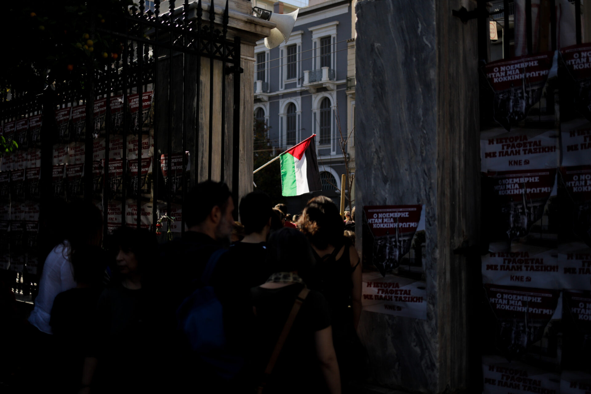 The Palestinian flag hangs outside the Polytechnic University during an annual march to commemorate the 1973 Greek student uprising in Athens on Nov. 17, 2023 (Victoras Antonopoulos)