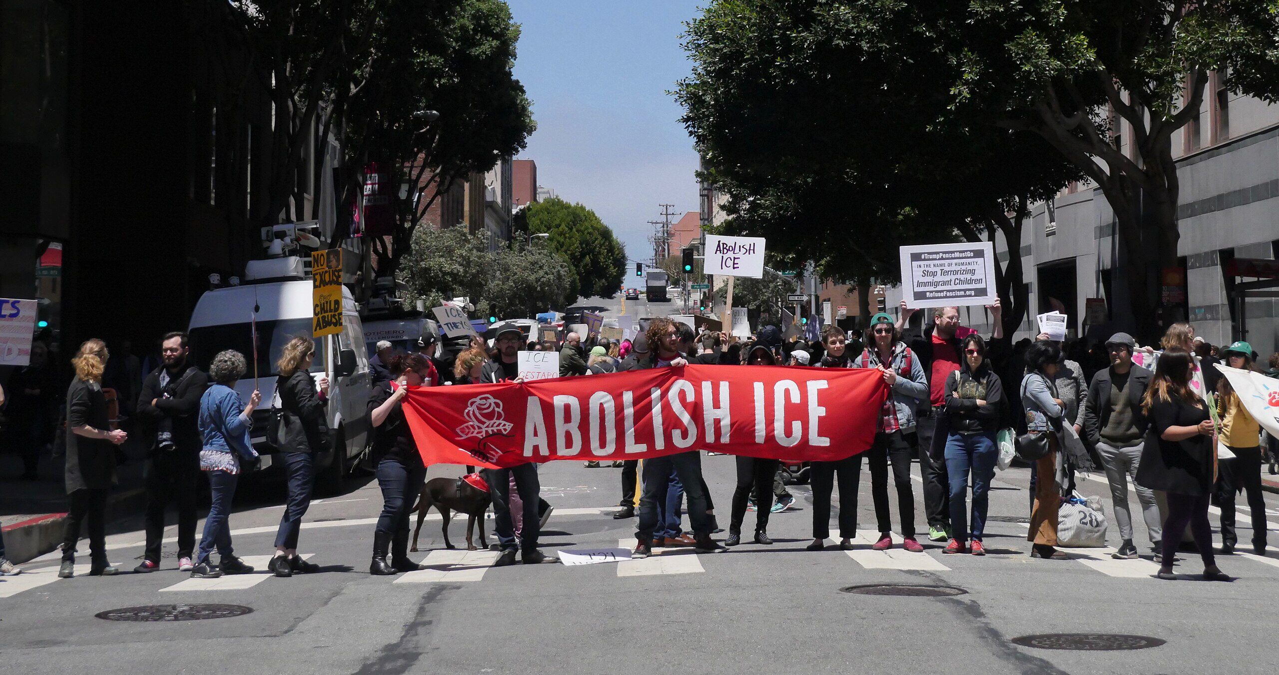 Protesters hold a banner reading "Abolish ICE" at a protest at the Department of Homeland Securityoffice in San Francisco denouncing Trump Administration's Zero Tolerance and Family Separation policies (Carwil Bjork-James/Wikimedia Commons)
