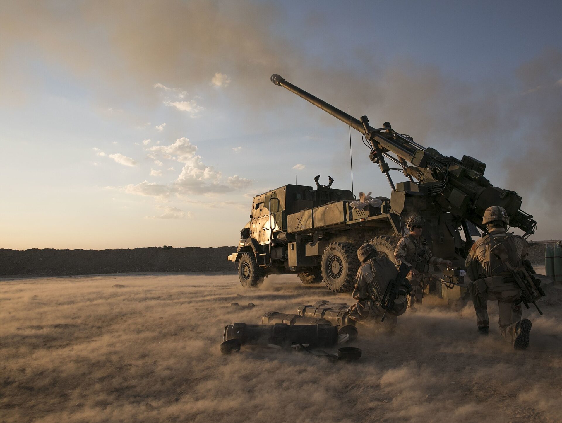 A French commander with Task Force Wagram, fires his 1,000th round from French Caesar in support of Operation Roundup in Al Quim, Iraq, May 16, 2018. As a non-permanent force the Coalition aims to enable the Iraqi security forces to be self-sufficient. (U.S. Army photo by Spc. Zakia Gray)