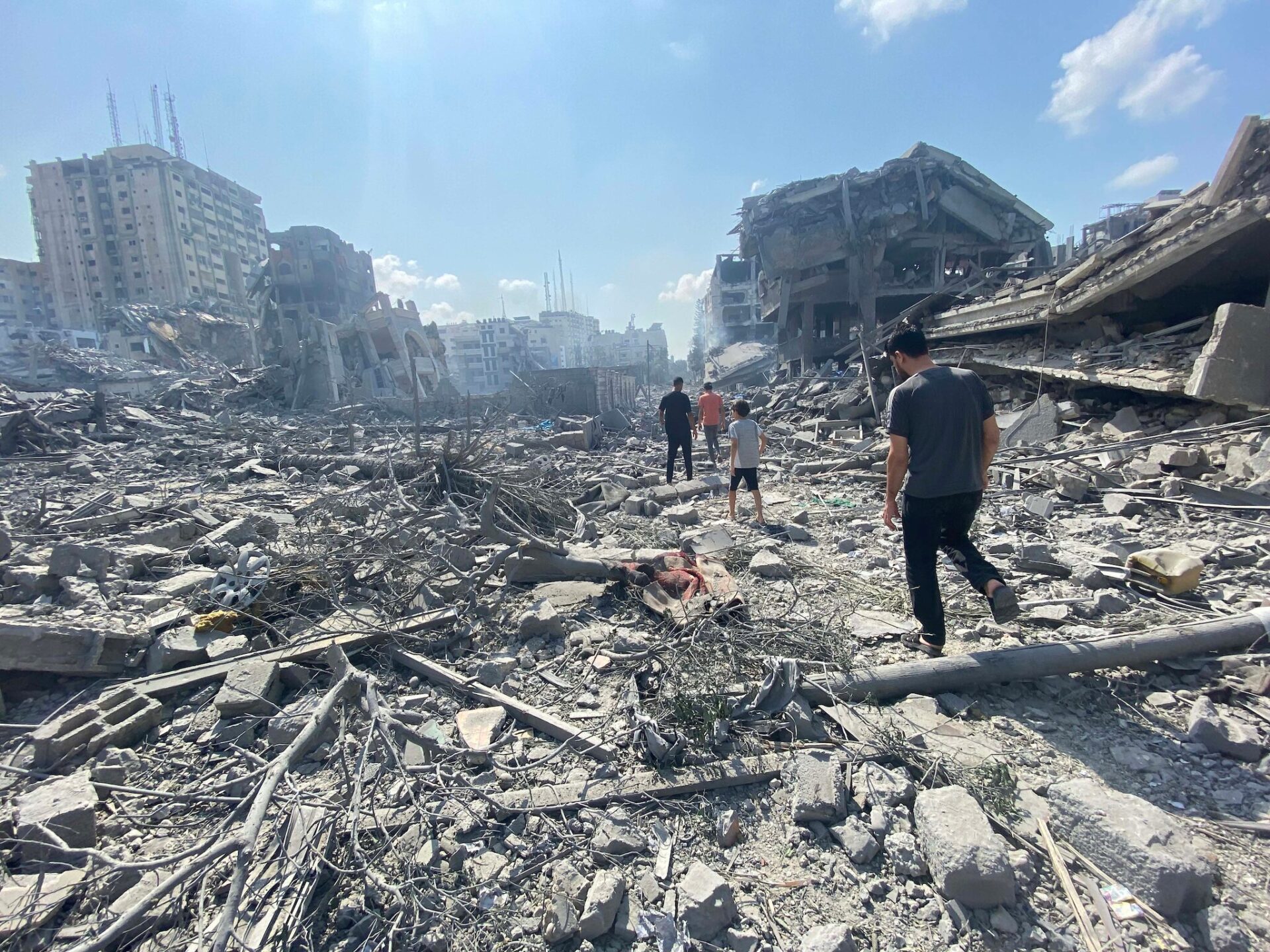Palestinians inspect the damage following an Israeli airstrike on the El-Remal aera in Gaza City on October 9, 2023. (WAFA)