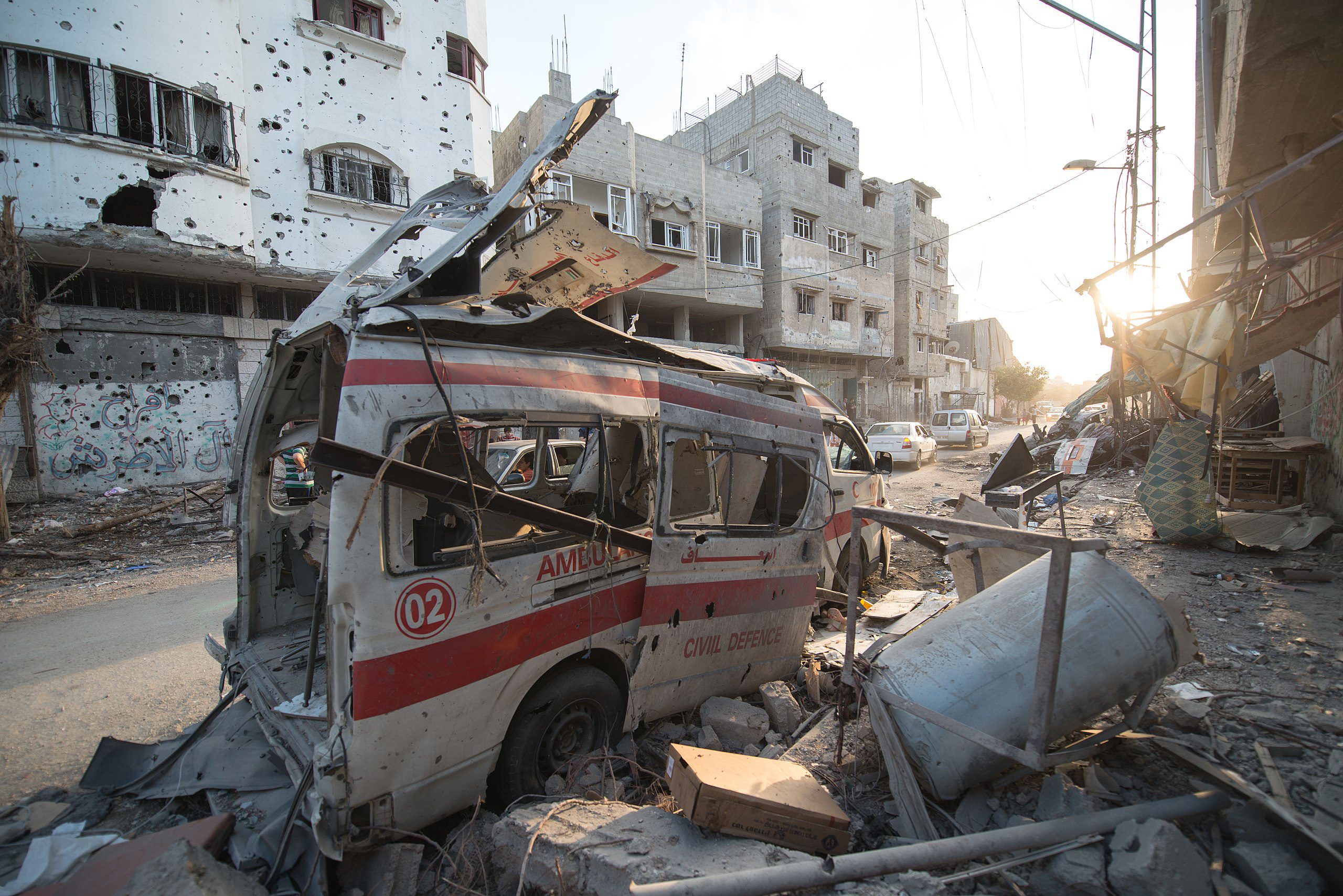 A photo shows a Palestinian ambulance destroyed during the 2014 Israeli war in the Gaza Strip (Boris Niehaus/Wikimedia Commons)