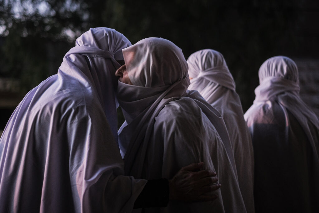 Residents of Baysour gather just before sunrise for the annual Liqaa al-Eid tradition on Eid al-Adha (João Sousa)