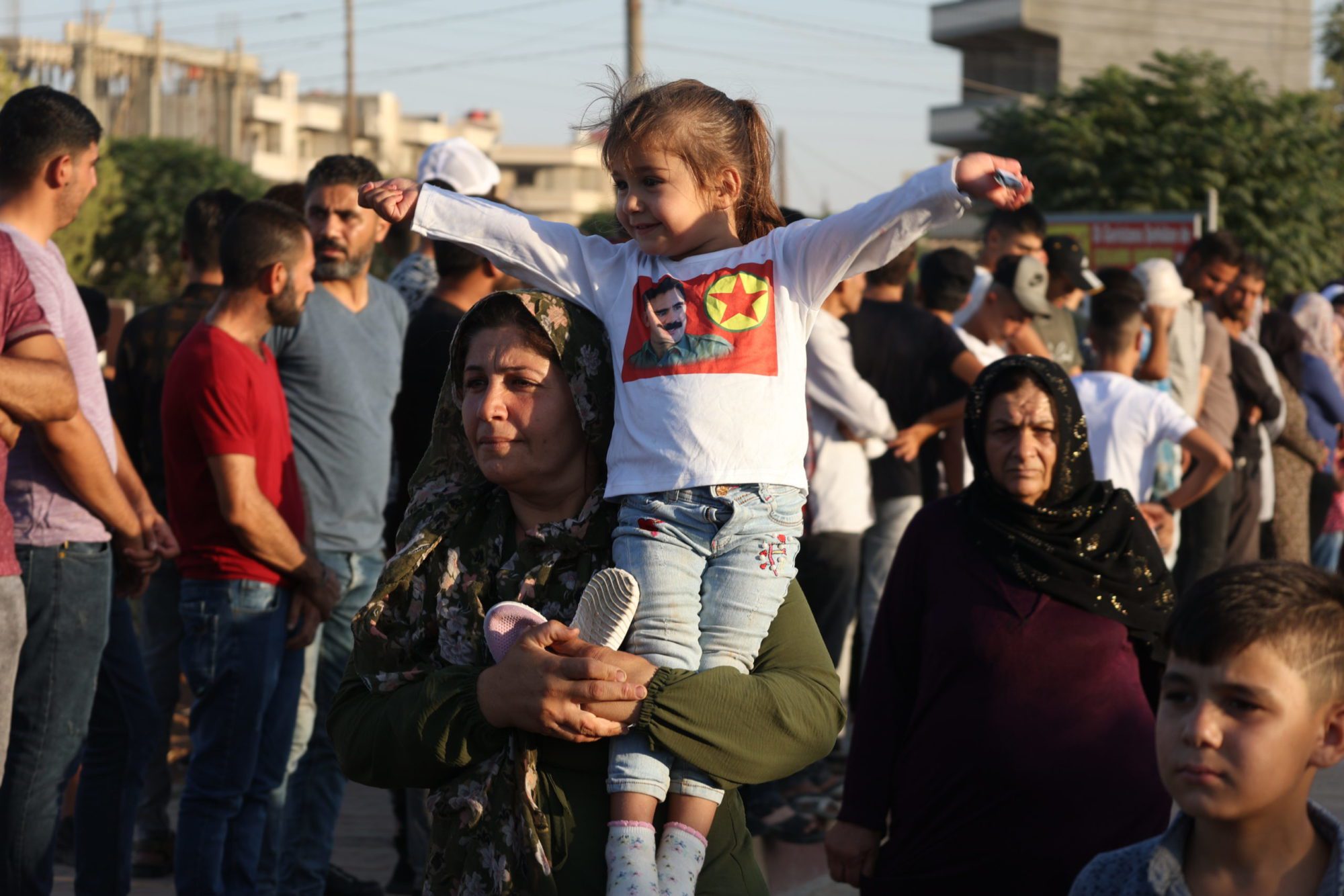 Girl-with-PKK-shirt-scaled-e1670584352127