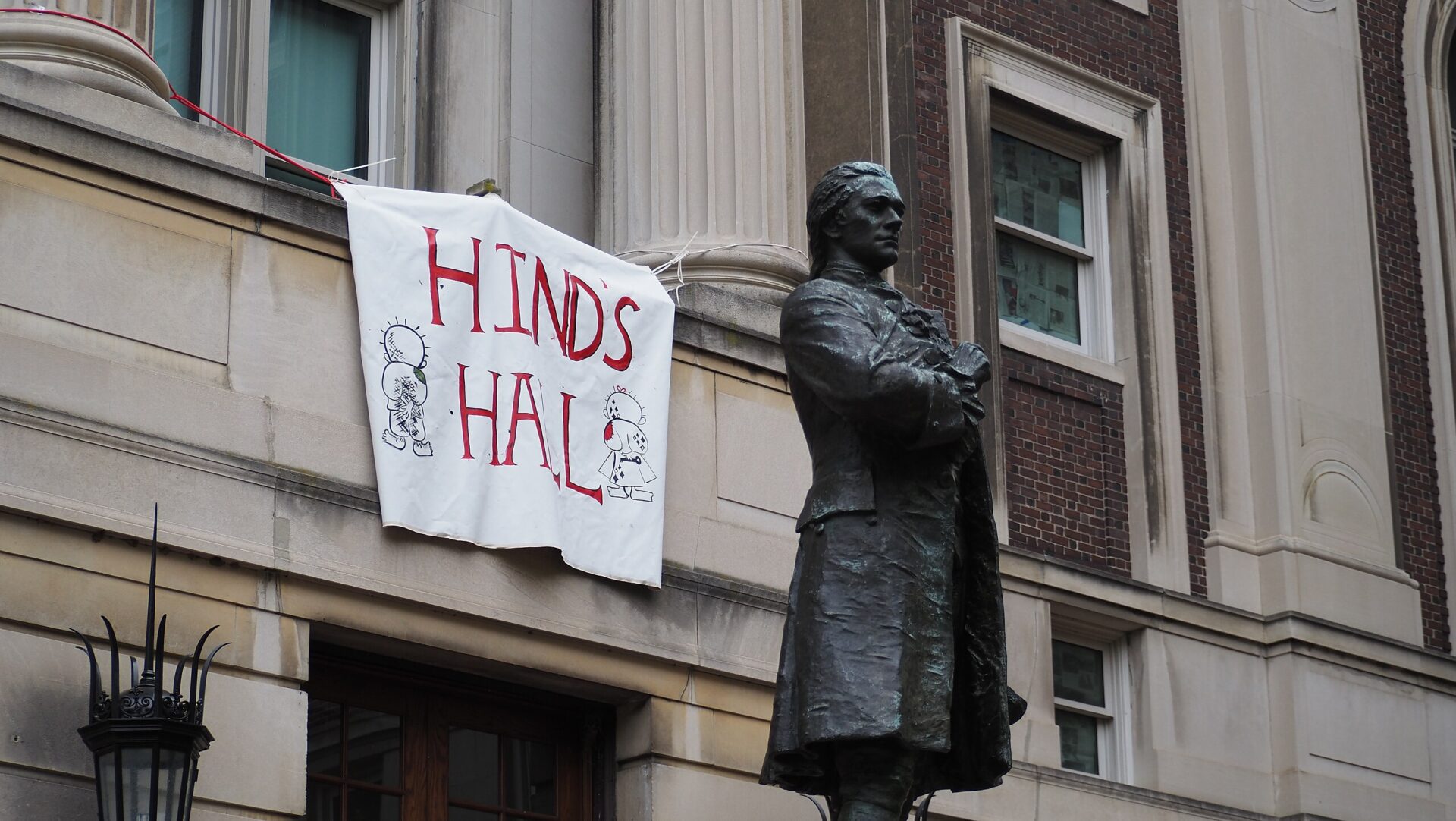 A banner hangs from Columbia's Hamilton Hall after protesters occupied the building, renaming it "Hind's Hall."