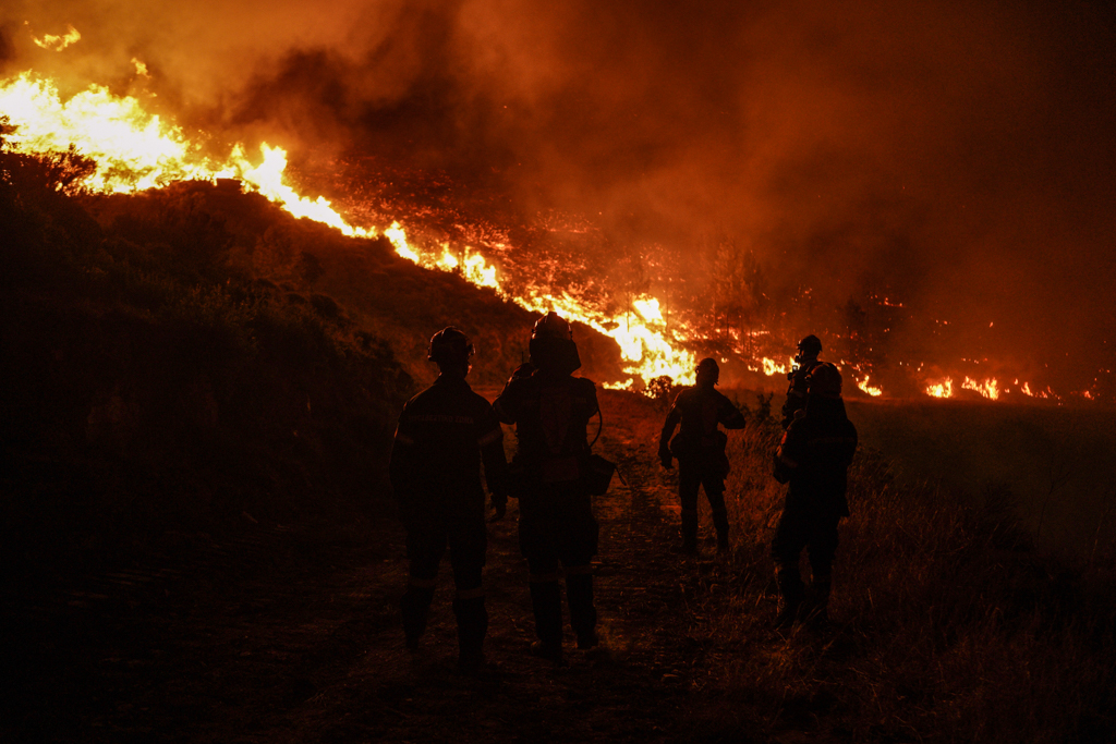 Local volunteer firefighters banded together in Dionysos on Aug. 12 (Nick Paleologos)