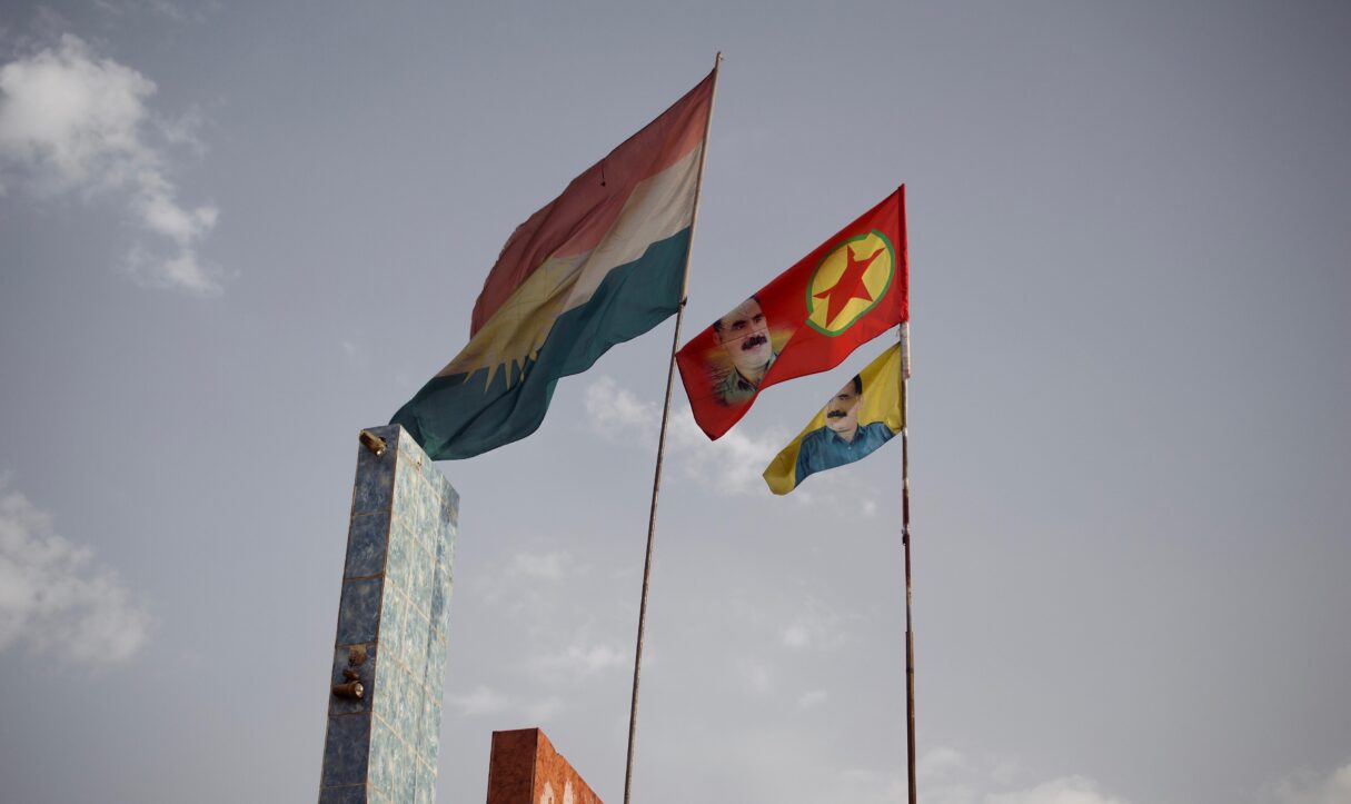 PKK and Kurdistan Regional Government flags fly in Kirkuk's Rahim Awa neighborhood in September 2017 (Levi Clancy/Wikimedia Commons)