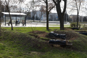 Bunkers dug into the grass of a park in the city center. Kramatorsk. March 2025.