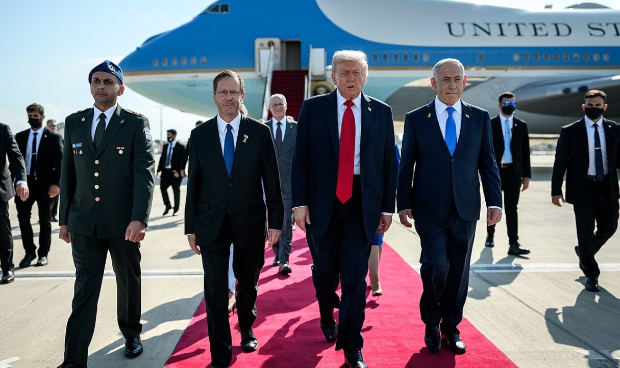 US President Donald Trump disembarks and meets with Israeli leaders during an October 2025 visit to the country (White House/Wikimedia Commons)
