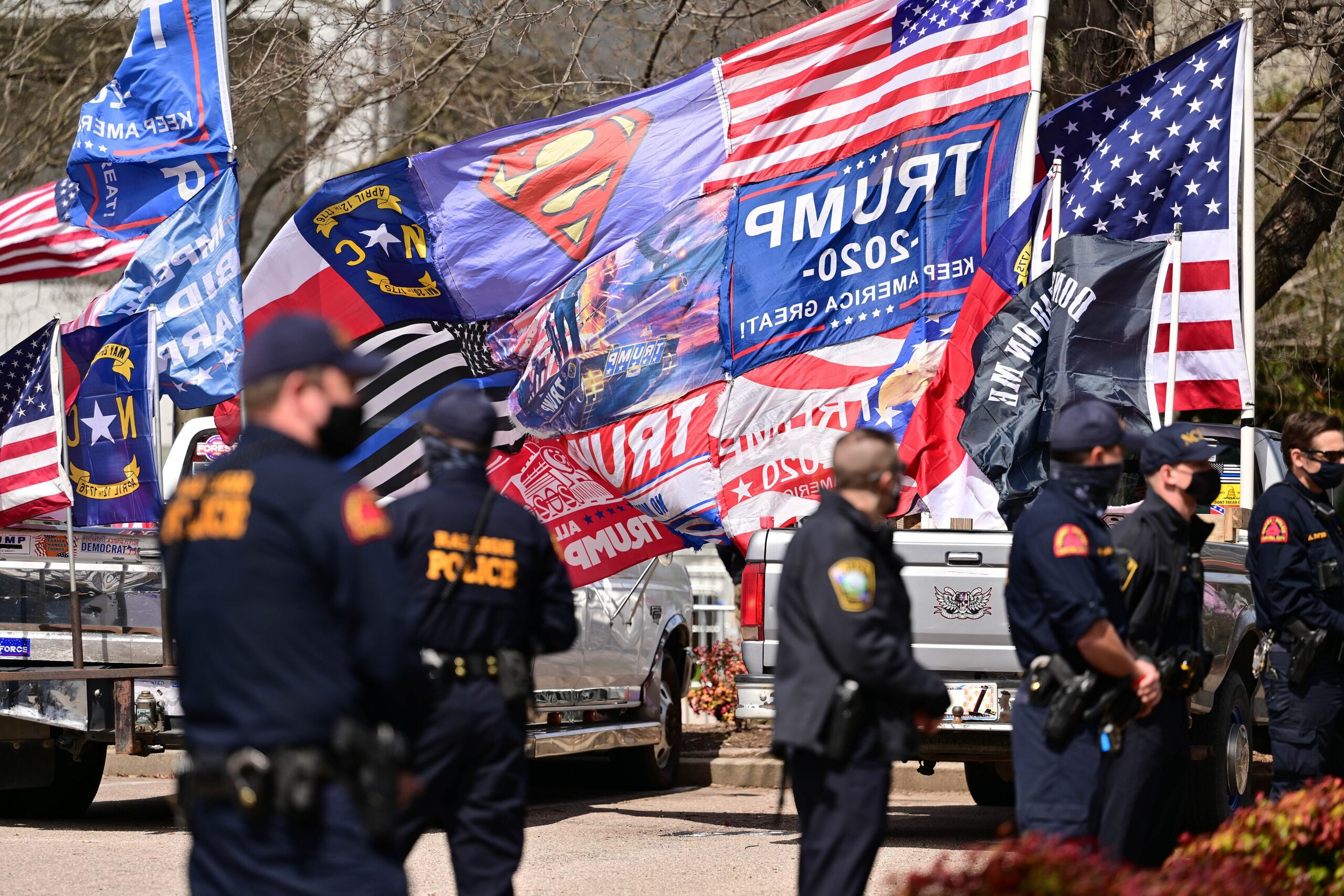Proud Boys gather near police at the World Wide Rally in Raleigh in March 2021 (Anthony Crider/Wikimedia Commons)
