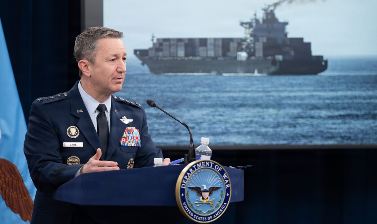 Chairman of the Joint Chiefs of Staff U.S. Air Force Gen. Dan Caine conducts a press briefing about Operation Epic Fury at the Pentagon, Washington, DC, in April 2026 (Eric Brann/Defense Department/Wikimedia Commons