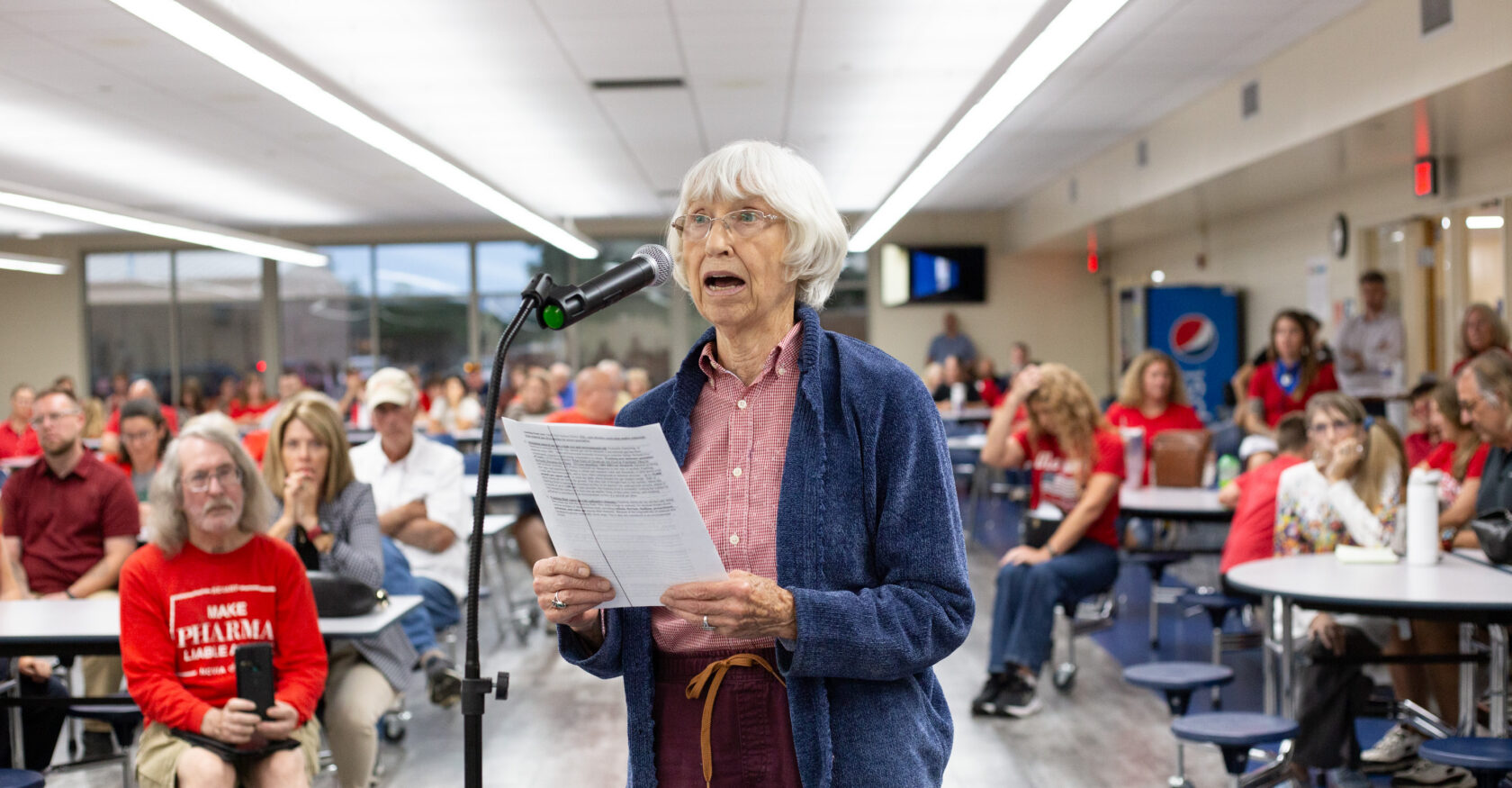 A woman speaks at an Anduril event held at Teays Valley High School (Taylor Dorrell)