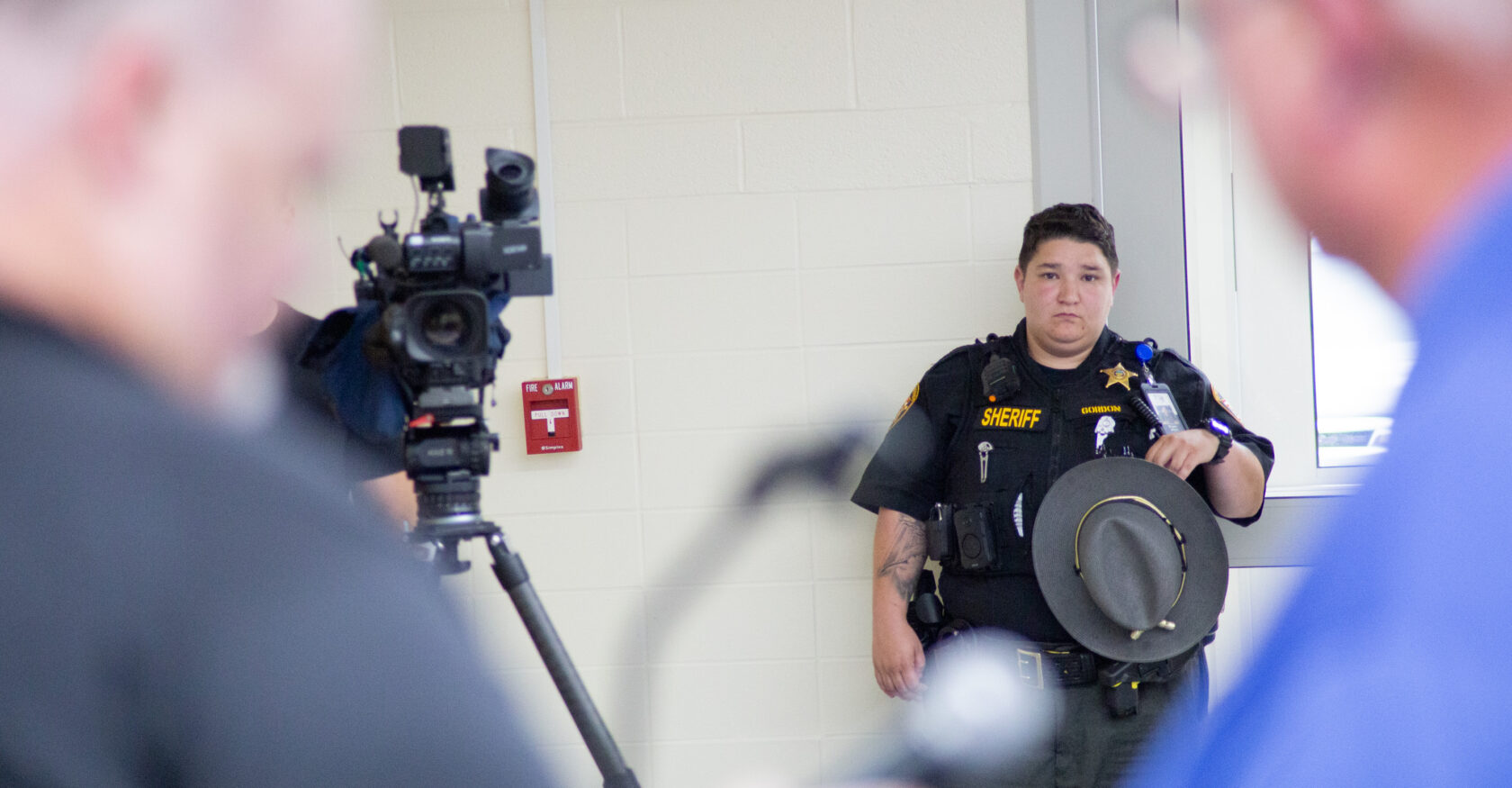 A police officer stands by during the data center hearing (Taylor Dorrell)