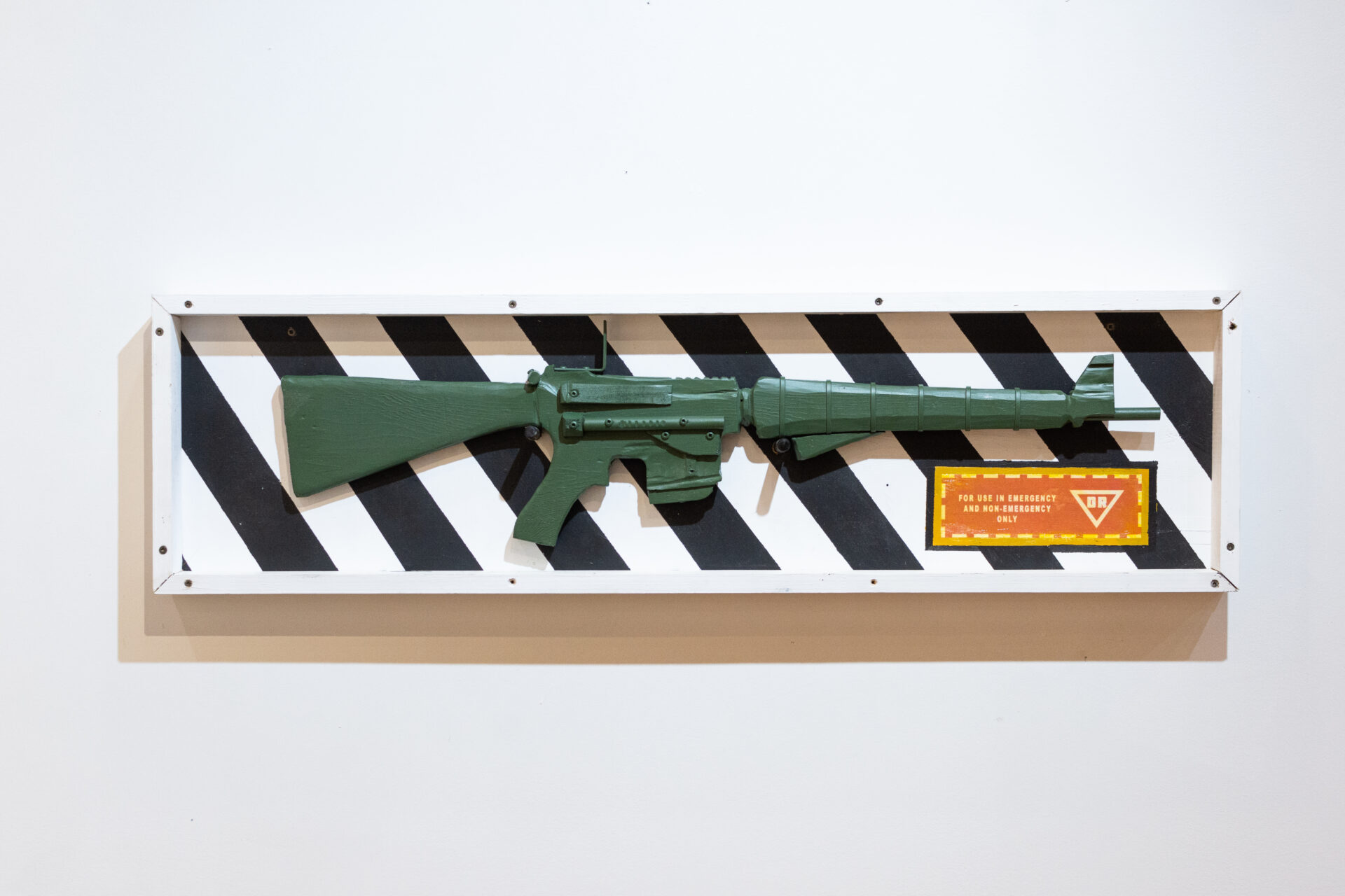 image of a painting by whit montgomery with a green rifle