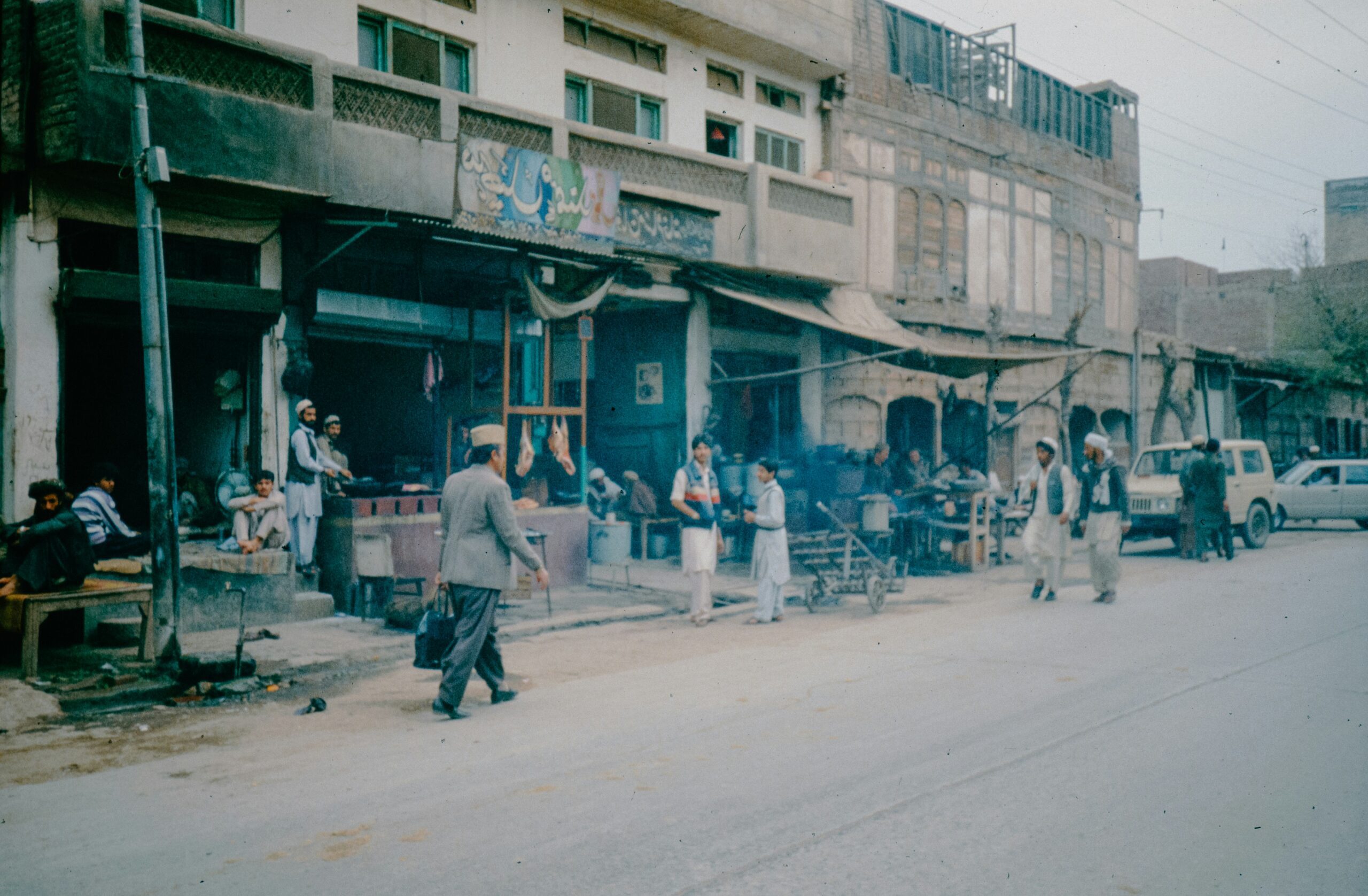 People go about their business in a Pakistani town in March 2025 (Annie Spratt/Unsplash)