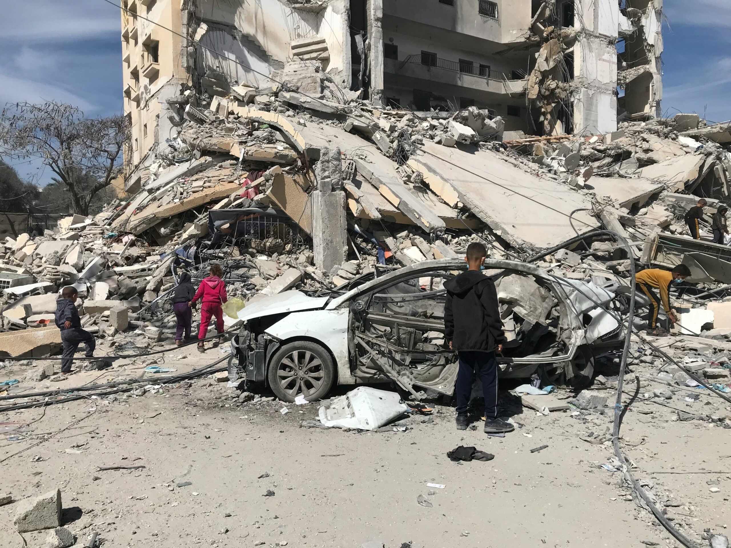 Scenes of the destruction suffered by the Al-Masry Tower, which consists of more than 10 floors and contains hundreds of displaced families in the besieged Gaza City (Emad El Byed via Unsplash)