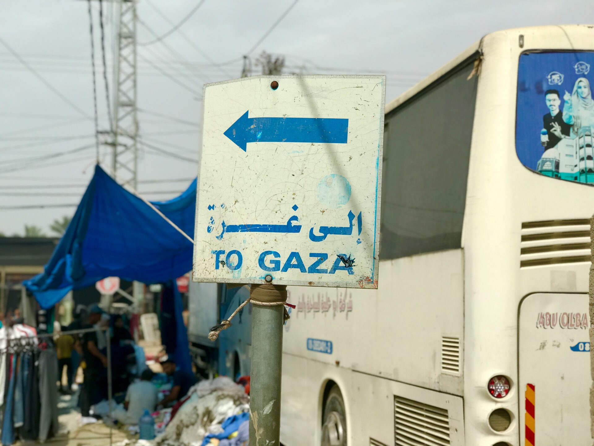 A photo shows a sign pointing toward Gaza City in May 2024 (Emad El Byed/Unsplash)