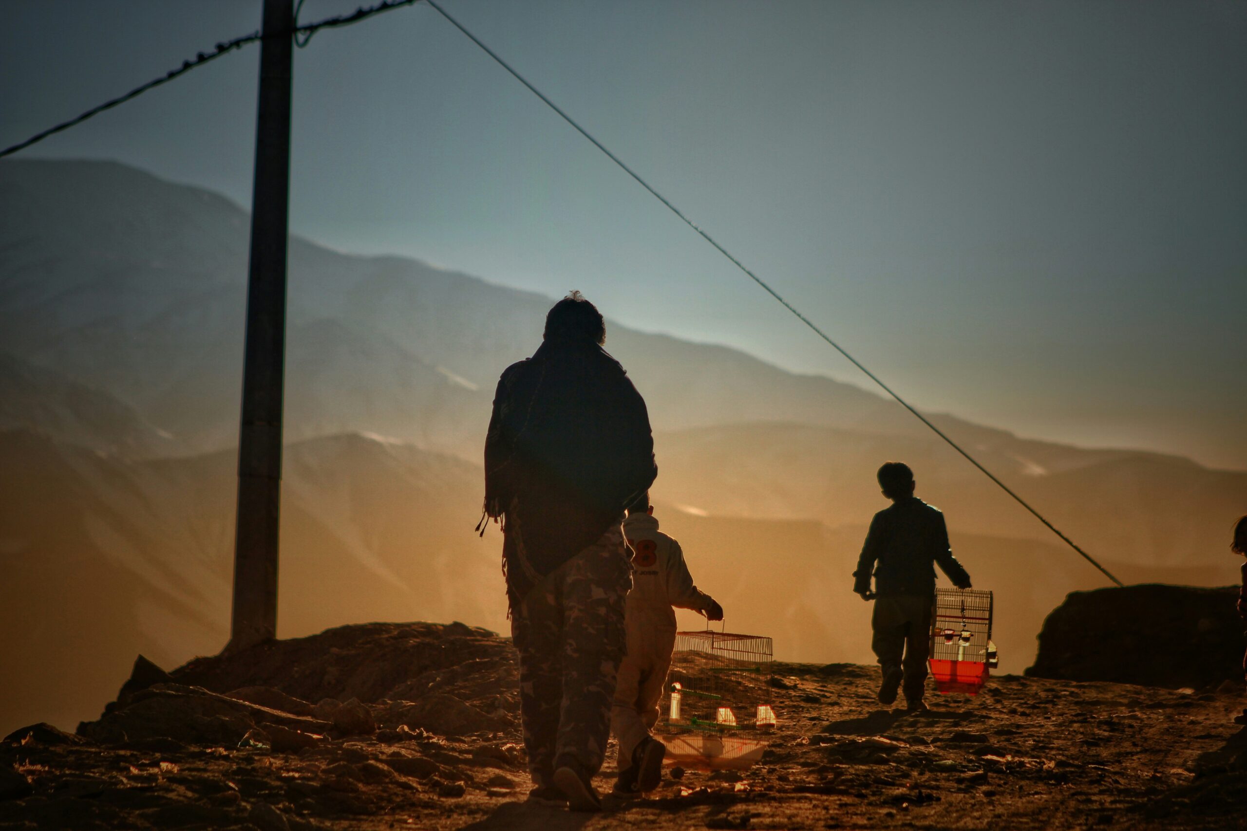 A photo of Afghans on the outskirts of Kabul in January 2022 (Farid Ershad via Unsplash)