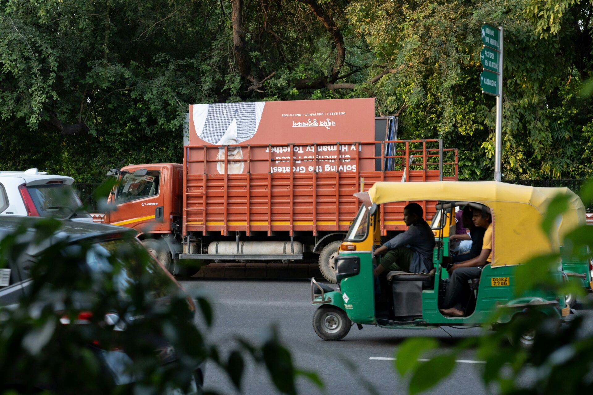 A photo shows a placard of Narenda Modi in the back of a truck in Delhi, India, in 2023 (Gayatri Malhotra)