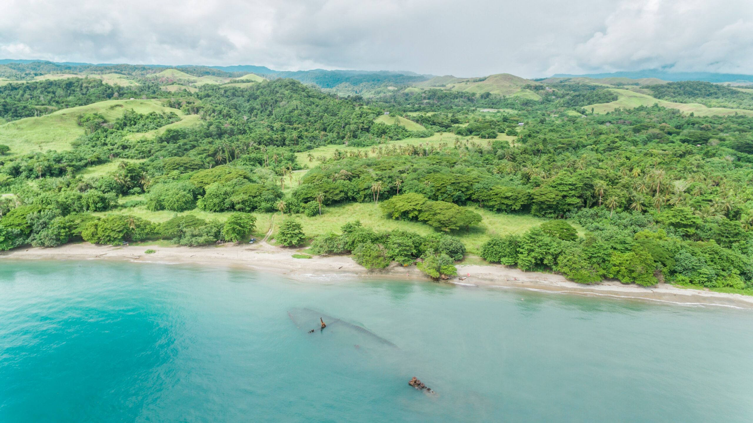 An aerial photograph shows the site of a Japanese shipwreck from World War II in the Solomon Islands' Guadalcanal Province (Gilly Tanabose via Unsplash)