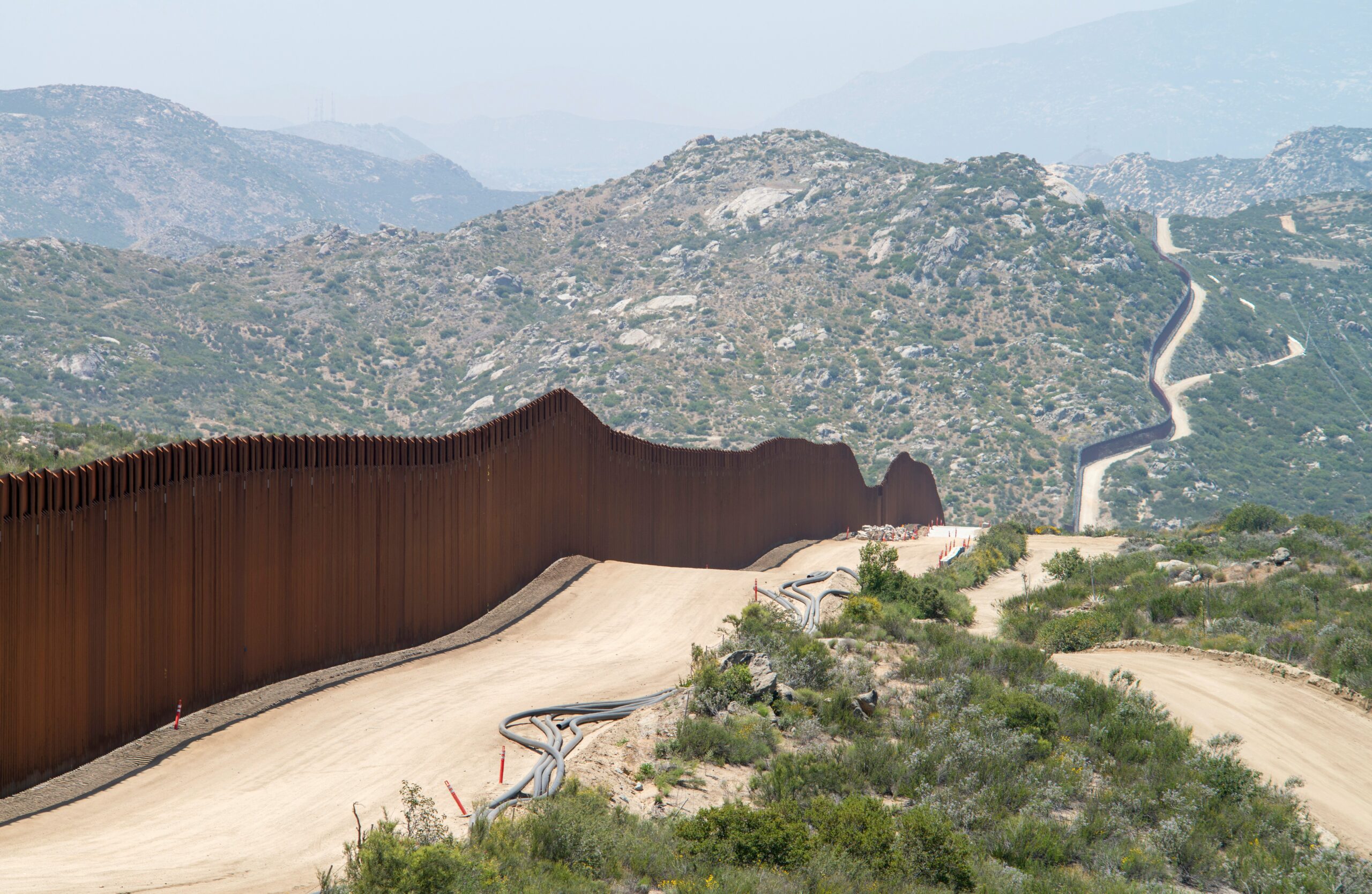 The US-Mexico border, with some construction still ongoing on the American side (Greg Bulla/Unsplash)