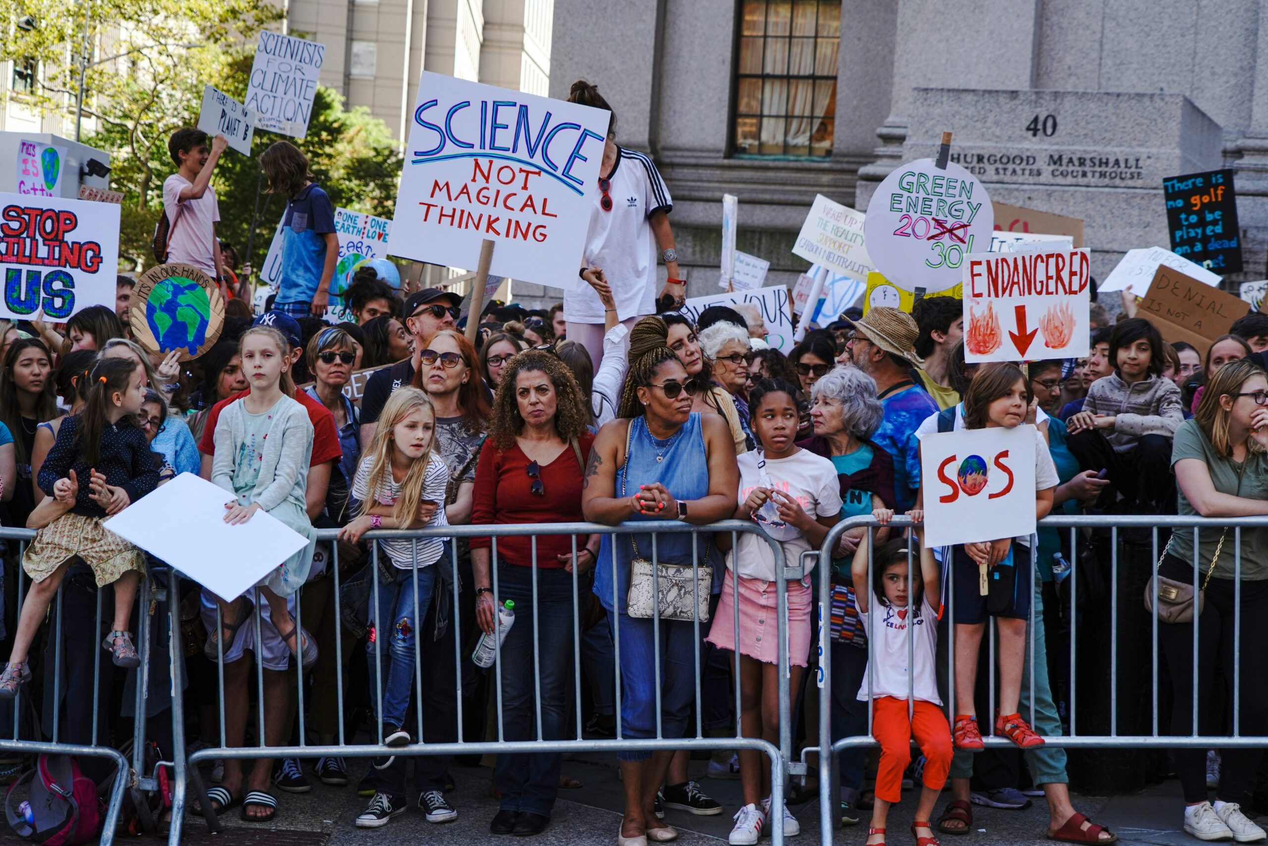 Activists young and old take a stand for climate change, climate action, and a better future. NYC September 2019 (Katie Rodriguez via Unsplash)