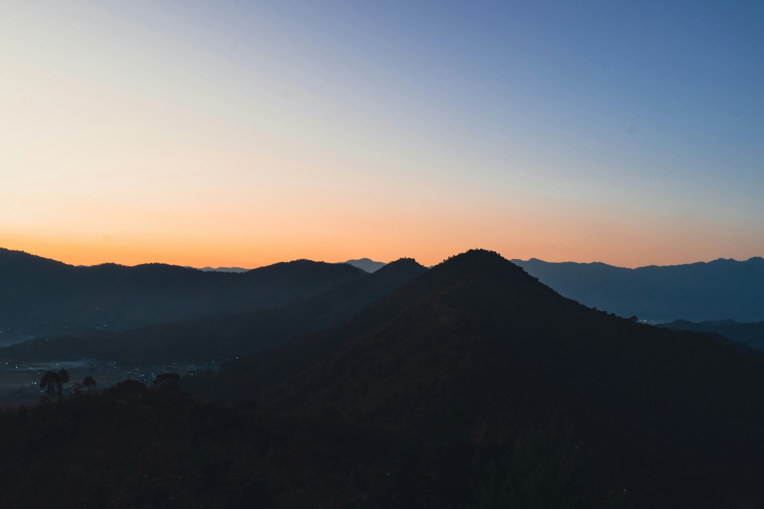 Dusk sets in on the mountains in Langol, Manipur, India (Leeder Bose via Unsplash)
