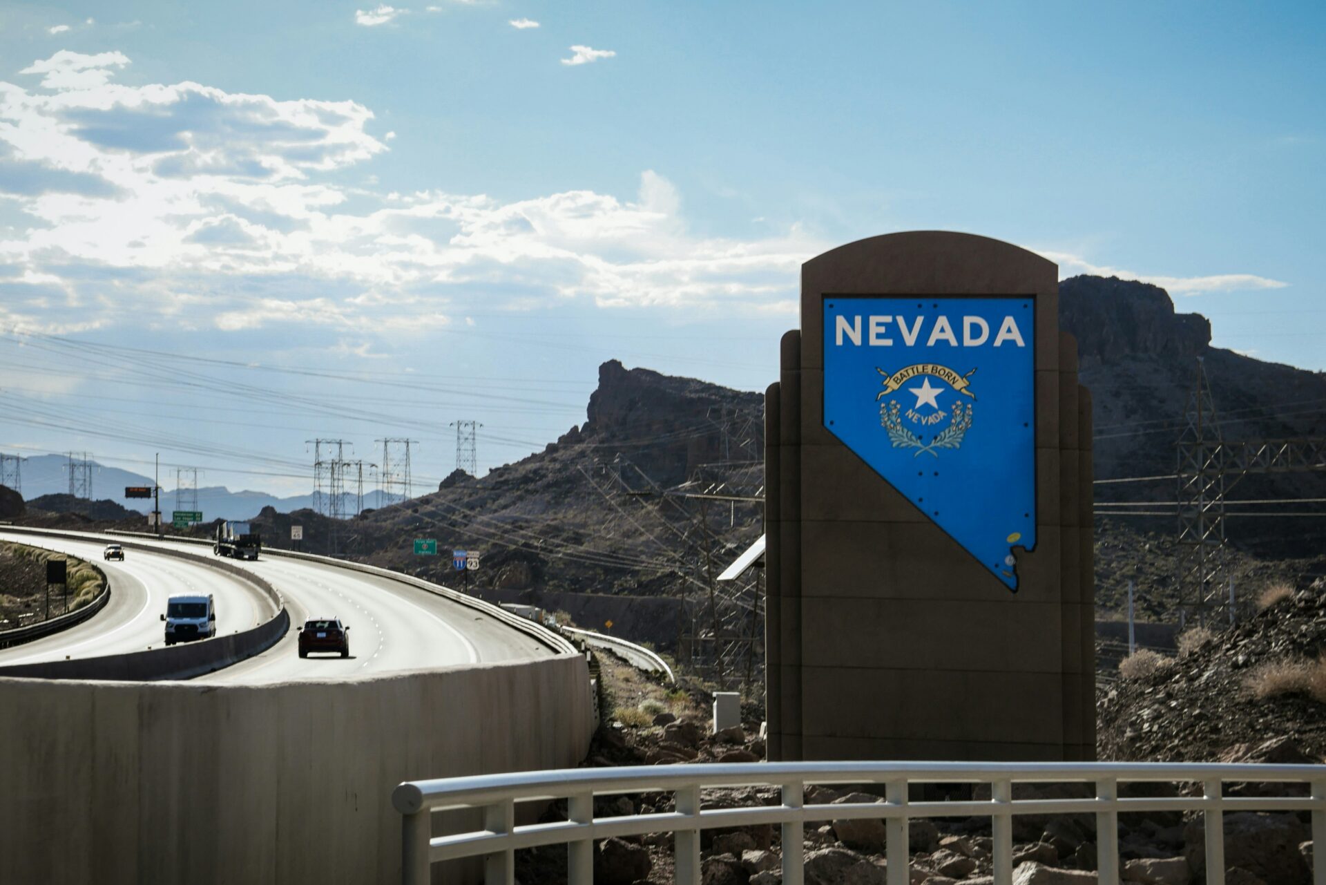 A highway sign marks the Nevada state line, June 2024 (Lennon Kong/Unsplash)