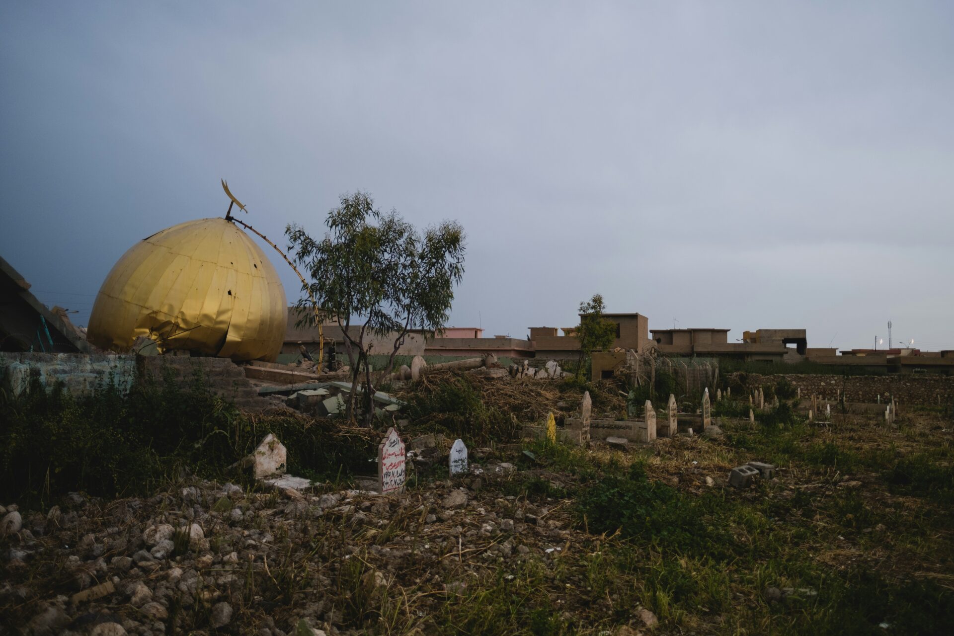 Published in February 2021, a photograph from Sinjar, Iraq, shows a Shia shrine the Islamic State of Iraq and Syria destroyed (Levi Meir Clancy/Unsplash)