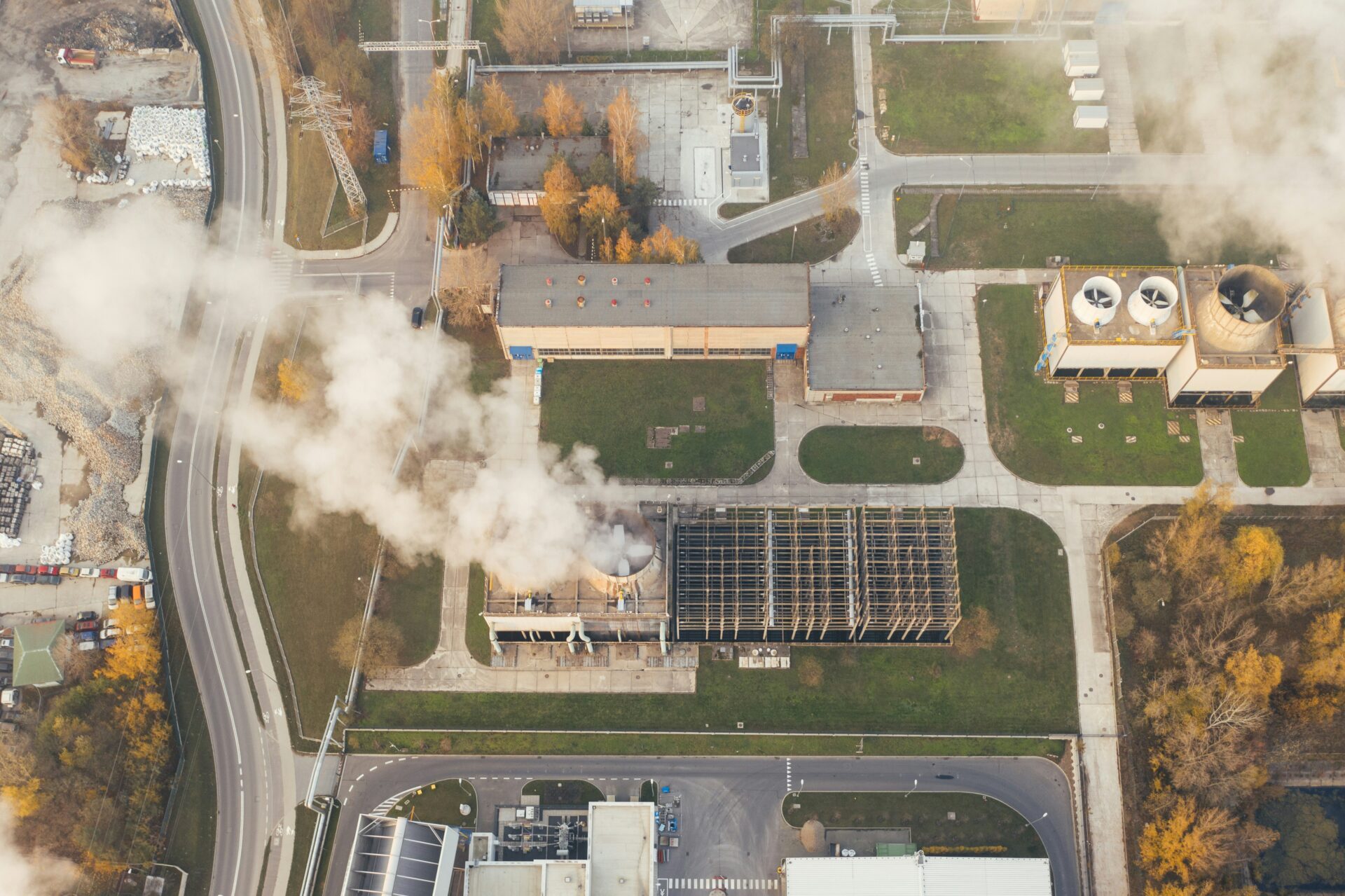 Plumes of smoke rise above buildings in Poland, published in January 2020 (Marcin Jozwiak via Unsplash)