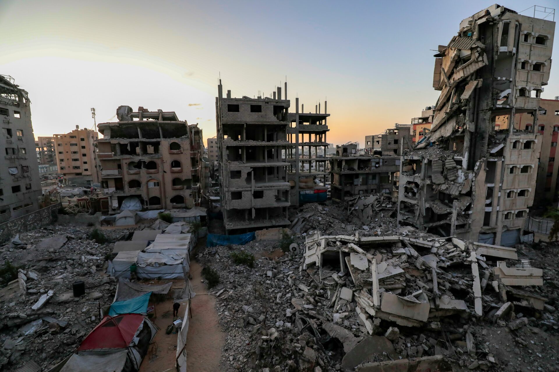 A photo shows destruction in a Gaza City neighborhood in December 2025 (Mohammed Ibrahim/Unsplash)