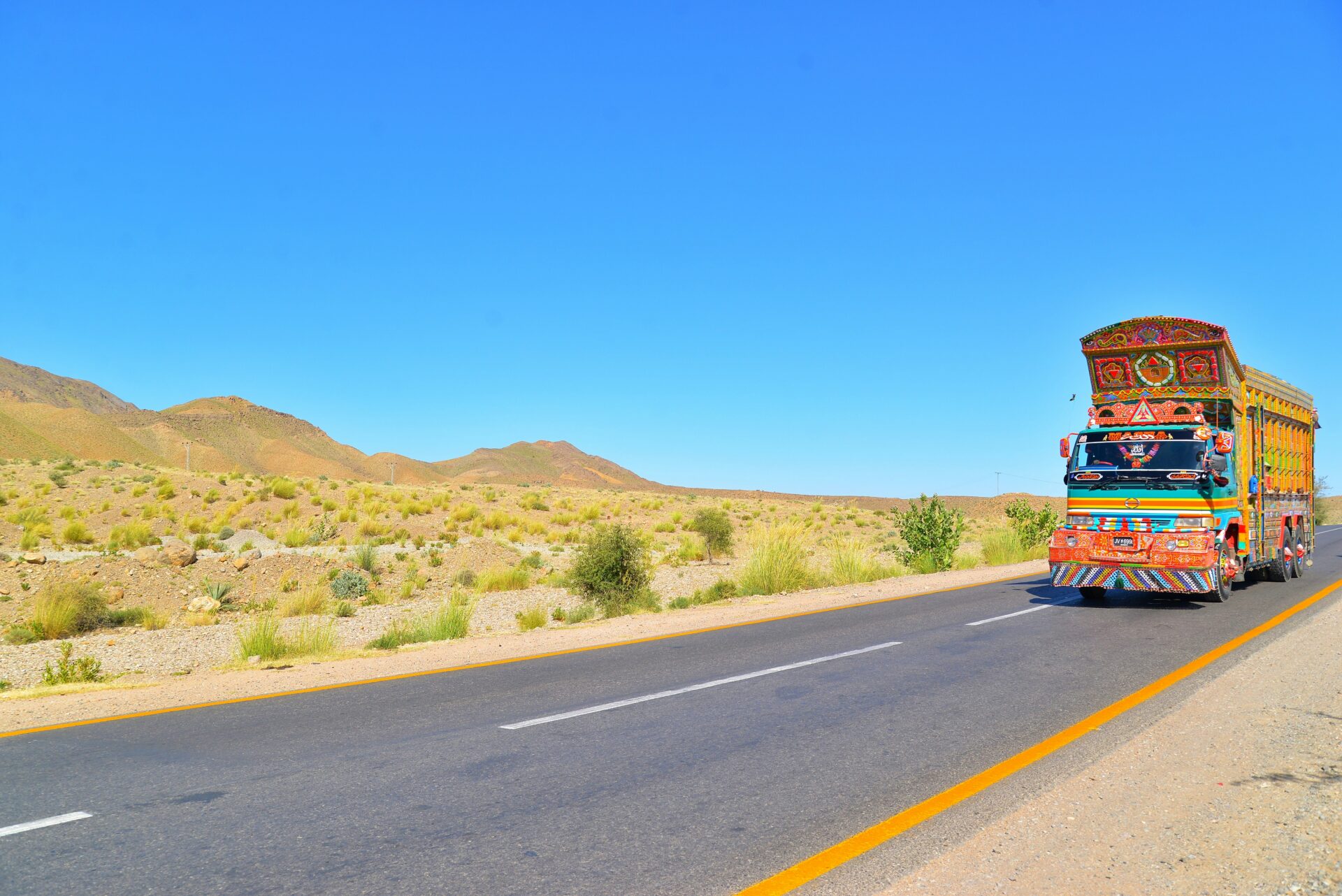 A truck travels along Balochistan Road, in Pakistan, in a photo published in October 2020 (Muneer Ahmed Ok via Unsplash)