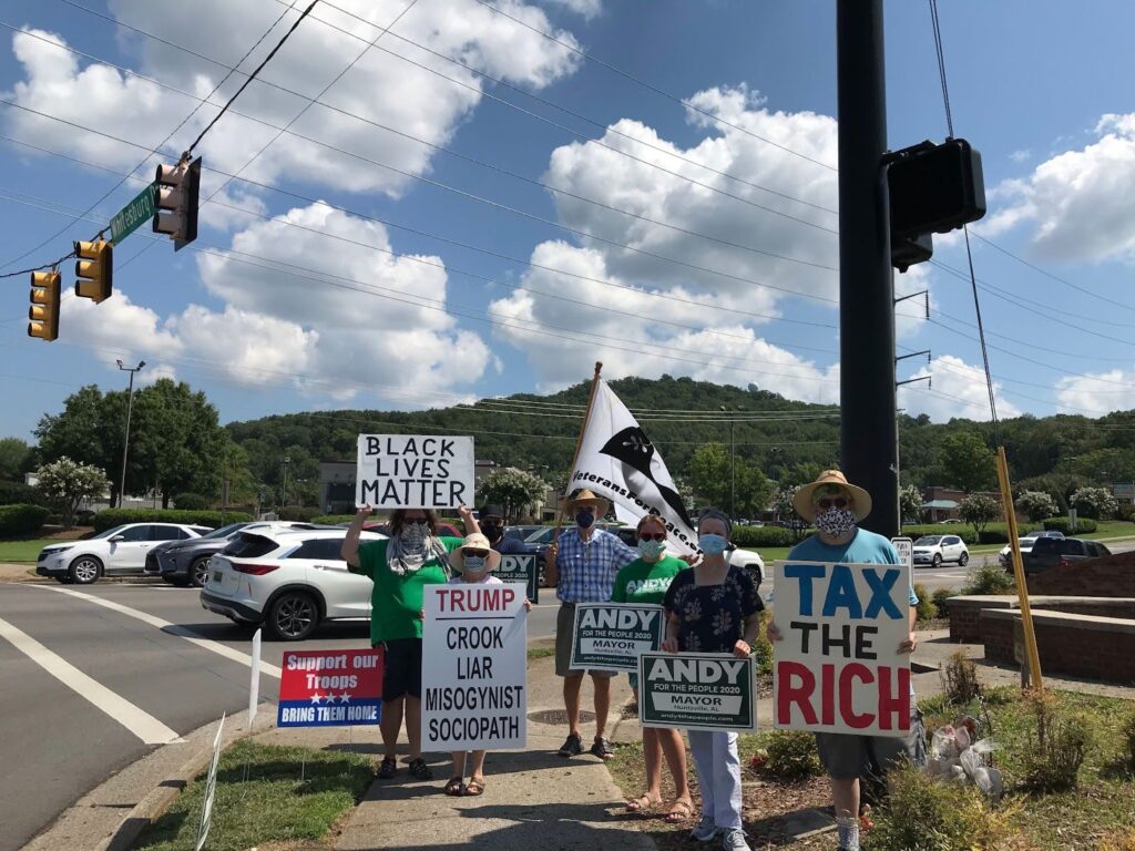 Protesters gather at Huntsville’s weekly “Peace Corner” (Taylor Barnes)