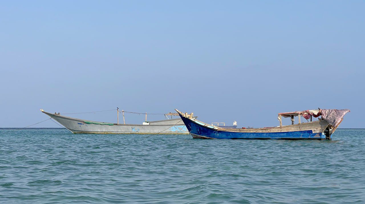 A photo shows ships in the water off Port Sudan in September 2025 (Malik Adam Abuzaid/Wikimedia Commons)